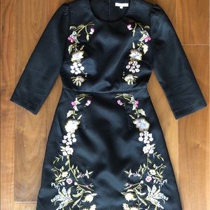 Black embroidered 3/4 sleeve mini dress.